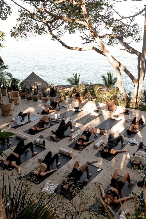 Outdoor Pilates session by the sea