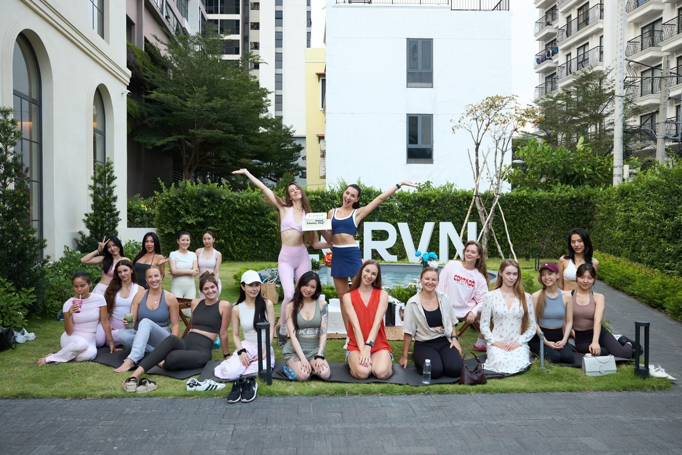 Pilates community on a hotel lawn